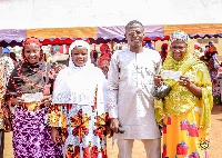 Dr Amin Adam in a pose with some beneficiaries