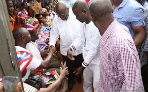 Akufo-Addo exchanging pleasantries  with some supporters(file photo)