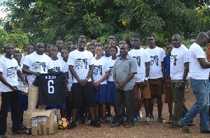 Afriyie Acquah with some of the students