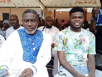 Thomas Partey (R) with his father
