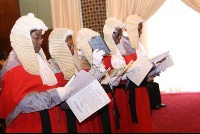 The newly sworn-in Appeal Court Judges reciting their oaths