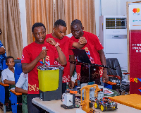 The Engineering Students showcasing their 'smart litter bins'