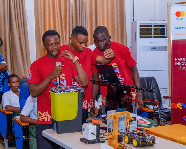 The Engineering Students showcasing their 'smart litter bins'