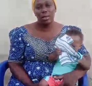 Ernestina Azu with her son