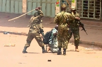Some officers of the Ghana Armed Forces  flogging residents