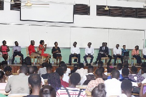 Panelist and students at the event