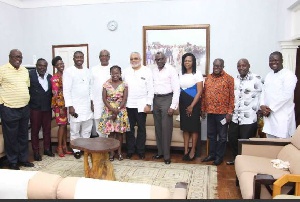 Rawlings and his guests, led by Mr. Kojo Bonsu, in a group photo