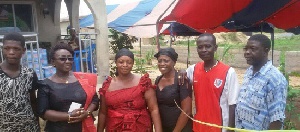 Dzifa Gomashie with family of late Bob Okala