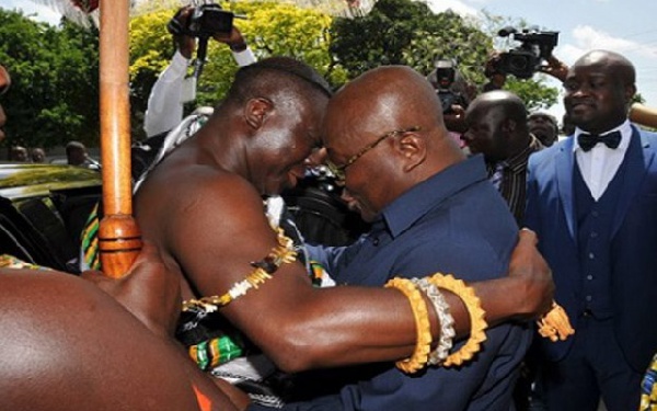 Asantehene Otumfuo Osei Tutu II in an embrace with President Nana Akufo-Addo