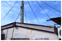 This single-room structure was built around an electric pole