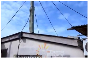 This single-room structure was built around an electric pole