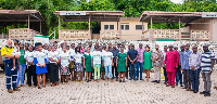 Some members of the club, nurses from the health center, and the 23 artisans in a group picture