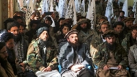Taliban watch newly recruited personnel during one February graduation ceremony