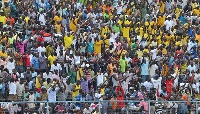 Ebusua Dwarfs fans celebrating a goal against Asante Kotoko.