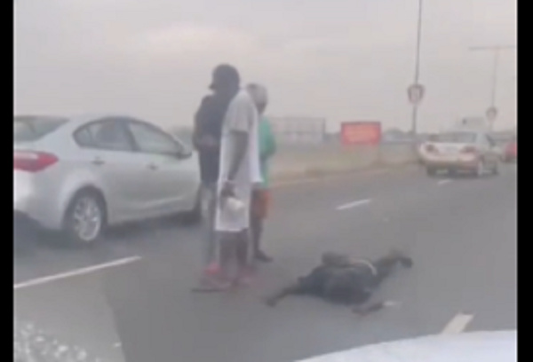 The mentally challenged man lying in the middle of the road