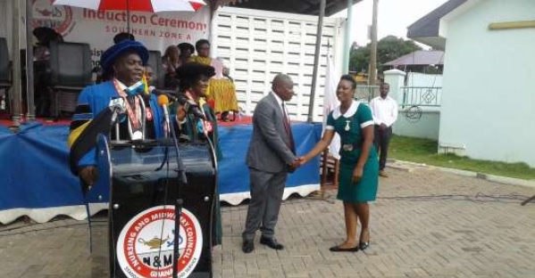 Ms Safia Sulemana being honoured by Health Minister, Agyeman Manu