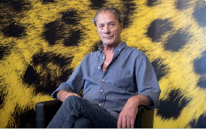 Palestinian actor Mohammed Bakri poses during the photocall for the film