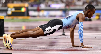 Kebinatshipi performed push-ups on the Tokyo track immediately after his 400m victory