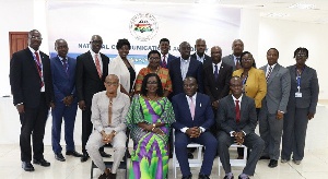 Mrs Ursula Owusu-Ekuful and Mustapha Hamid in a group photograph with management of NCA