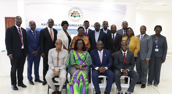 Mrs Ursula Owusu-Ekuful and Mustapha Hamid in a group photograph with management of NCA