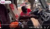 Oliver Barker-Vormawor removing the key of the police vehicle