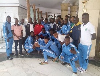 Aduana Stars team with Ambassador Paul Okoh  in suit