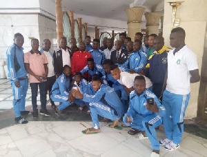 Aduana Stars team with Ambassador Paul Okoh  in suit