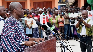 VP Amissah-Arthur addressing Obuasi residents at the opening of the modern bus terminal in Obuasi