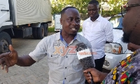 Emmanuel Gemegah, MCE for Keta interacting with Prince Minkah