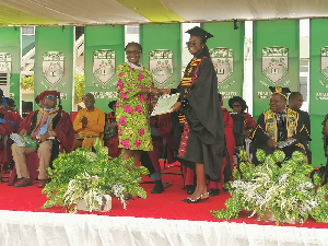 Mbanya Kamkeng Naomi receiving her prize