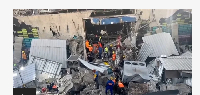 Rescue workers dey search di rubble for survivors