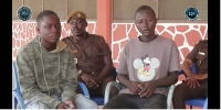 The suspects Michael Etuah and Bernard Obiri with police officers