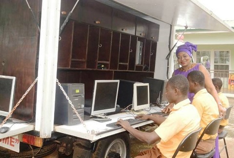 Maame Pokua Sawyerr with the students