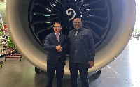 Ghana's Ambassador to the USA, Victor Smith (R) with an official from Boeing in Seattle