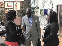 Mr Apaalse interacting with Mrs Alice Torkokoo of GPHA (left) and Dr. J. Noonoo