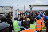 President Akufo-Addo being taken through the construction process of the footbridges