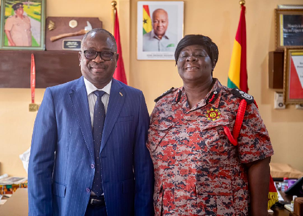 The minister with the Chief Fire Officer during the visit