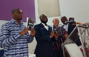 Fadi Dabbousi (2nd left) and Dr Nyamkum (right) launching the book
