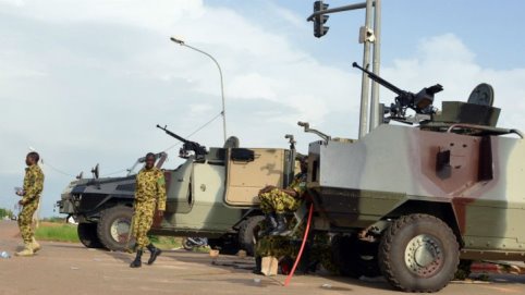 Troops guard the presidential palace in Ouagadougou on September 17, 2015 in the wake of a coup