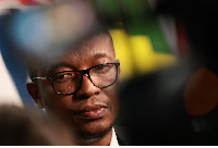 South African Minister of Trade, Industry and Competition, Parks Tau speaks to members of the media