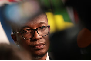 South African Minister of Trade, Industry and Competition, Parks Tau speaks to members of the media