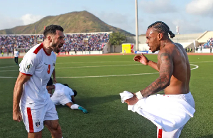 Roberto Lopes, (L), and Garry Rodrigues celebrate their qualification for thethe 2026 FIFA World Cup