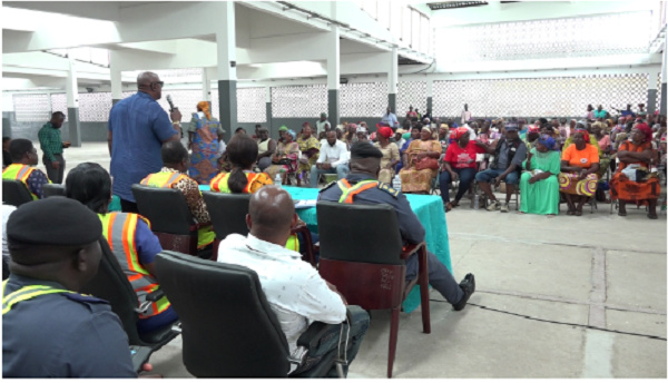 Management of Tema Fishing Harbour during meeting with stakeholders at fish market hall