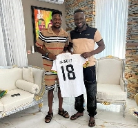 Black Stars defender, Daniel Amartey with Pastor Elvis Agyemang