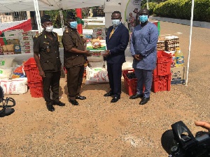Officials of KOSMOS Energy Ghana making the donation