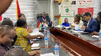 The minister in the midst of other stakeholders during the MoU