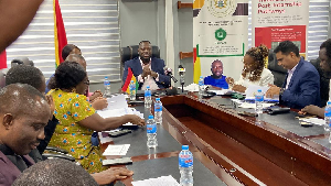 The minister in the midst of other stakeholders during the MoU