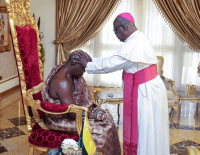 The Catholic Archbishop of Kumasi, Most Rev Gabriel Justice Anokye, praying for the Asantehene