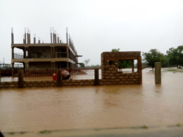 Acres of farmlands buried under floodwaters.