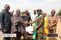Brig. Gen. Albert Dawohoso receiving his award